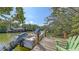Waterfront property features a private dock with boat access at 120 Hammock Rd, Anna Maria, FL 34216