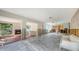 Partially renovated living room showcasing an open floor plan and a cozy fireplace feature at 120 Hammock Rd, Anna Maria, FL 34216