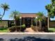 Attractive community clubhouse entrance featuring stone accents, landscaping, and clear signage at 1214 56Th W St # 1214, Bradenton, FL 34209