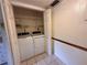 Conveniently located in-closet laundry area with washer and dryer hookups and shelving at 1214 56Th W St # 1214, Bradenton, FL 34209