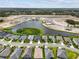 Aerial view of a community showing the lake and homes in an upcoming development at 12339 Glenridge Ln, Parrish, FL 34219