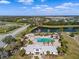 Community aerial view features a lake, with a community center, pool, playground, and splash pad at 12339 Glenridge Ln, Parrish, FL 34219