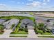 Aerial view of the houses showcasing the community's serene setting with ponds and well-manicured landscaping at 12339 Glenridge Ln, Parrish, FL 34219