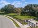 Community dog park with fenced-in area, mature trees, and benches provides a pet-friendly haven at 12339 Glenridge Ln, Parrish, FL 34219