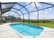Screened-in pool area with comfortable lounge chairs, ideal for outdoor relaxation and recreation at 12339 Glenridge Ln, Parrish, FL 34219