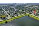 Aerial view of the neighborhood near a scenic lake, providing tranquil views and a serene environment at 1234 29Th St N, St Petersburg, FL 33713