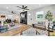 Bright living room with fireplace, wood floors, and an open and airy layout at 1234 29Th St N, St Petersburg, FL 33713