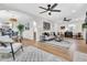 Open-concept living space with dining area and modern furnishings at 1234 29Th St N, St Petersburg, FL 33713