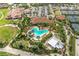 Aerial view of community amenities including the pool, tennis courts, and clubhouse at 12822 Del Corso Loop, Bradenton, FL 34211
