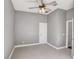 Neutral bedroom with ceiling fan and light carpet at 12822 Del Corso Loop, Bradenton, FL 34211