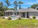 Screened-in pool and covered lanai perfect for enjoying outdoor living and entertaining at 1298 Russellville St, North Port, FL 34288