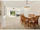 Open floor plan with a dining area that connects to an office space and kitchen at 1629 Pelican Cove Rd # 138A, Sarasota, FL 34231