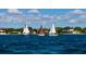 Water view featuring 3 sail boats on the water at 1629 Pelican Cove Rd # 138A, Sarasota, FL 34231