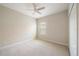 Small, empty bedroom with carpet, ceiling fan, closet, and one window provides natural light at 1739 Lake Verona Cir, Bradenton, FL 34211