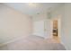 Empty bedroom with carpet and closet; note the door to the laundry with newer washer and dryer, too at 1739 Lake Verona Cir, Bradenton, FL 34211