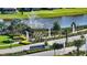 Beautiful community entrance with lush landscaping, a water fountain, and an elegant sign, welcoming residents and guests alike at 17726 Gulf Ranch Pl, Lakewood Ranch, FL 34211