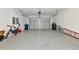 Spacious garage with sealed floors and overhead door providing ample parking at 17904 Palmiste Dr, Bradenton, FL 34202