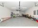 Spacious garage with clean epoxy flooring and ample storage for bikes and sports equipment at 17904 Palmiste Dr, Bradenton, FL 34202