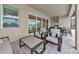 Outdoor seating area featuring a dining space and built-in grill for al fresco dining at 17904 Palmiste Dr, Bradenton, FL 34202