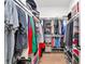 Organized walk-in closet with ample storage for clothes, shoes, and accessories at 17904 Palmiste Dr, Bradenton, FL 34202