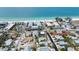 Stunning aerial view of beachfront neighborhood with beautiful white sand and turquoise water at 205 71St St # B, Holmes Beach, FL 34217