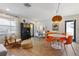 Open living area with a dining table, stylish decor, and a cozy atmosphere, perfect for entertaining at 205 71St St # B, Holmes Beach, FL 34217