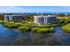 Scenic waterfront condos nestled amongst tropical greenery with Gulf views at 2120 Harbourside Dr # 617, Longboat Key, FL 34228