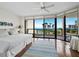 Bright bedroom with an exterior view and a ceiling fan at 2120 Harbourside Dr # 617, Longboat Key, FL 34228