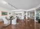 Open floor plan with dining area and kitchen offering a seamless flow for entertaining and everyday living at 2120 Harbourside Dr # 617, Longboat Key, FL 34228