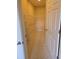 A walk in closet with carpet flooring, wire shelving and ample storage space at 24028 Park Place S Dr # 32, Punta Gorda, FL 33980