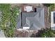 Aerial view of a gray metal roof, showcasing the roof shape and construction material on a two-story home at 2485 S Milmar Dr, Sarasota, FL 34237