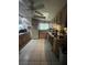 Open kitchen with tile flooring, functional appliances, and wood cabinets at 2494 S Milmar Dr, Sarasota, FL 34237