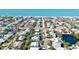Enjoy the beautiful beach community from this aerial view of several waterfront homes at 306 68Th St, Holmes Beach, FL 34217