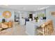 Open kitchen with bar seating, bright countertops, and a view into other rooms at 306 68Th St, Holmes Beach, FL 34217