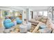 Spacious open-concept living and dining area, beautifully decorated with modern furniture and ample natural light at 306 68Th St, Holmes Beach, FL 34217