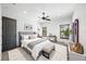 Serene bedroom with neutral tones, a plush bed, and ample natural light, creating a comfortable and stylish space at 3576 San Remo Ter, Sarasota, FL 34239