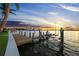 Private boat dock featuring lift with picturesque water views for easy access to boating and waterfront enjoyment at 3576 San Remo Ter, Sarasota, FL 34239