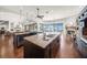 Open-concept kitchen offers granite countertops, large center island, and waterfront views at 3576 San Remo Ter, Sarasota, FL 34239
