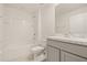 Bathroom featuring a combination tub and shower and modern vanity at 3834 Silver Strand Trl, Palmetto, FL 34221