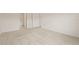 Bedroom featuring neutral carpeting, and a doorway leading to another room at 3834 Silver Strand Trl, Palmetto, FL 34221