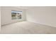 Bedroom with carpet flooring and a window at 3834 Silver Strand Trl, Palmetto, FL 34221