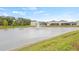 Pond with fountain with houses in the background at 3834 Silver Strand Trl, Palmetto, FL 34221