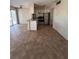 Functional kitchen with stainless steel appliances and tile flooring for easy maintenance at 4035 S School Ave # D3, Sarasota, FL 34231