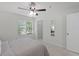 This is a bedroom with large window and closet at 4037 Crockers Lake Blvd # 17, Sarasota, FL 34238