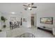 Open living room with neutral color scheme, tile floors, ceiling fan, with dining area at 4037 Crockers Lake Blvd # 17, Sarasota, FL 34238
