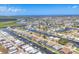 An aerial view shows a waterfront community with winding canals, boat docks, and houses at 4312 Vasco St, Punta Gorda, FL 33950