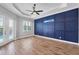 Bedroom features a tray ceiling, ceiling fan, and private access to the pool area at 4312 Vasco St, Punta Gorda, FL 33950