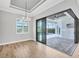 Dining room showcases a seamless transition to the outdoor living space through large sliding doors at 4312 Vasco St, Punta Gorda, FL 33950