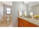 Bathroom features granite counters and tile flooring at 4471 Atwood Cay Cir # 13, Sarasota, FL 34233