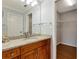 Bathroom features granite counters and access to walk-in closet at 4471 Atwood Cay Cir # 13, Sarasota, FL 34233